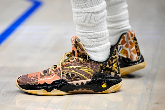 Dallas Mavericks guard Kyrie Irving's cheetah-print ANTA sneakers.